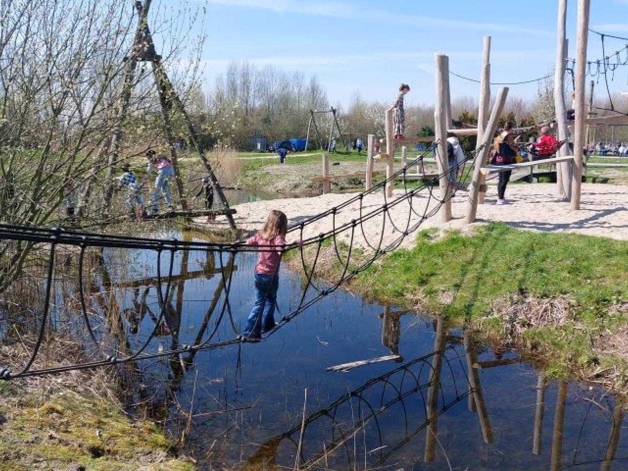 Playing child at Jeugdland Nieuw-Vennep