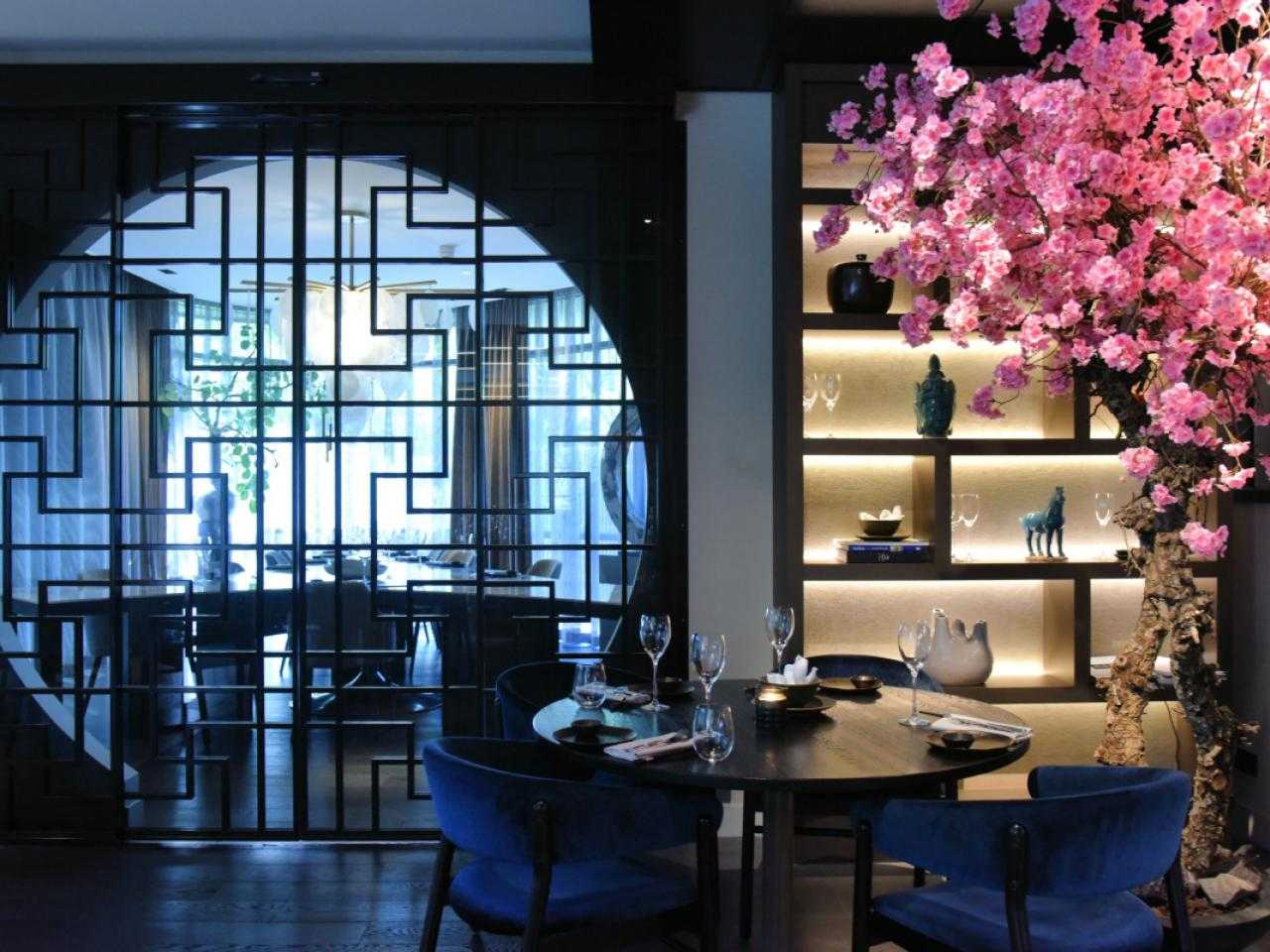 Interior with blossom tree of restaurant masami
