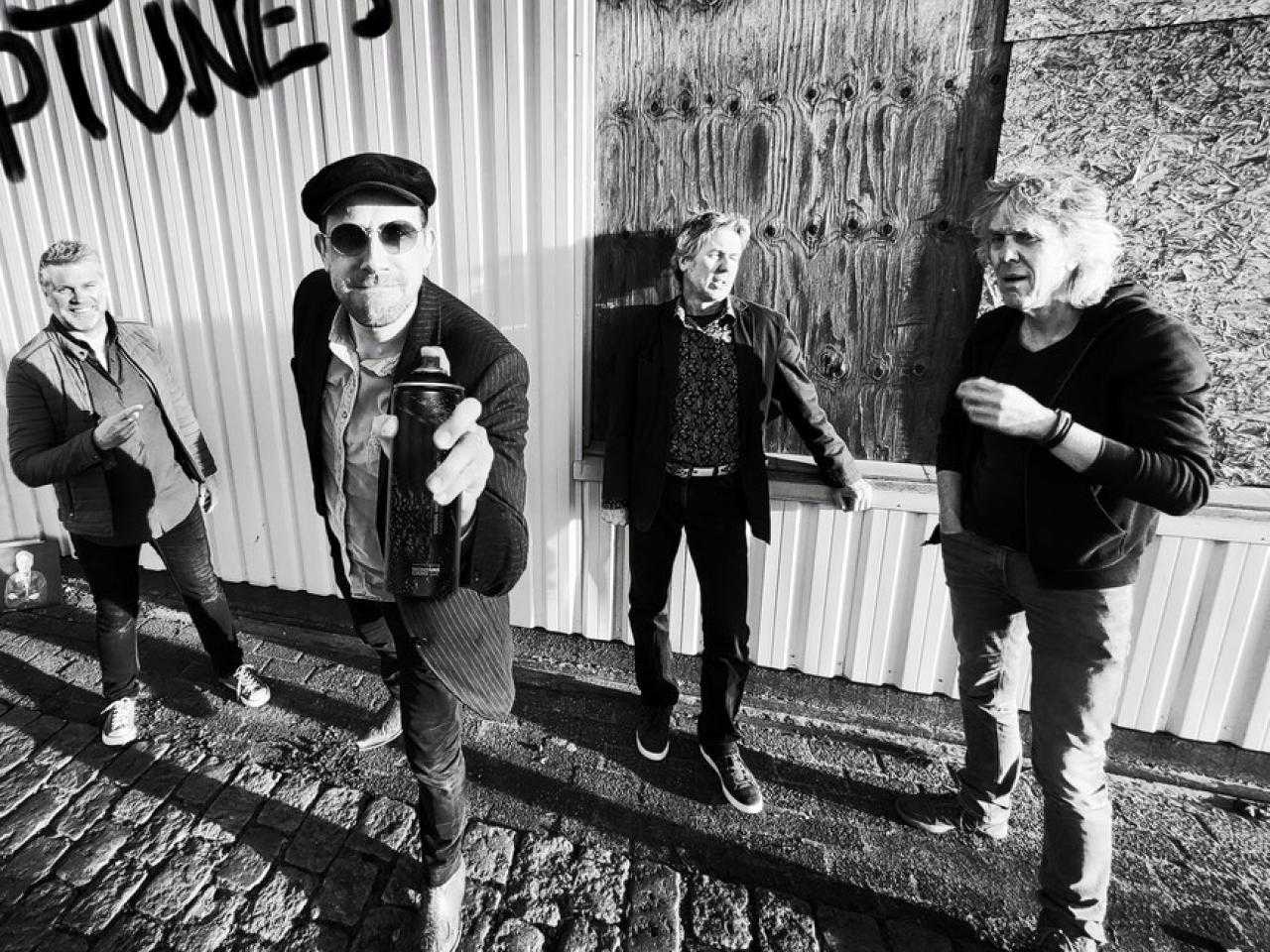 groepsfoto van de band