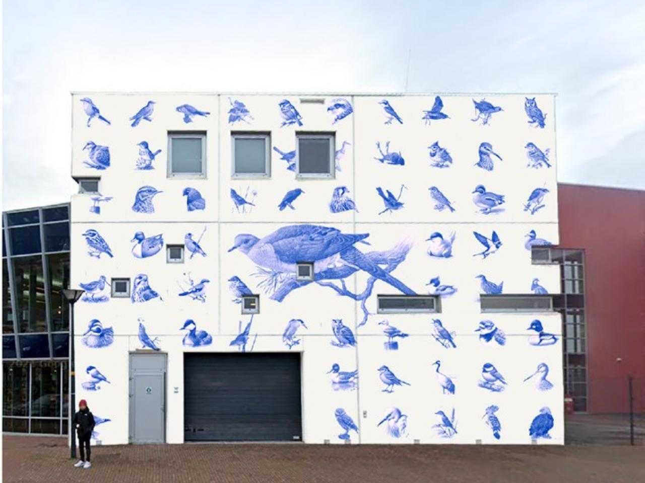 Kunstwerk op zijkant van gebouw